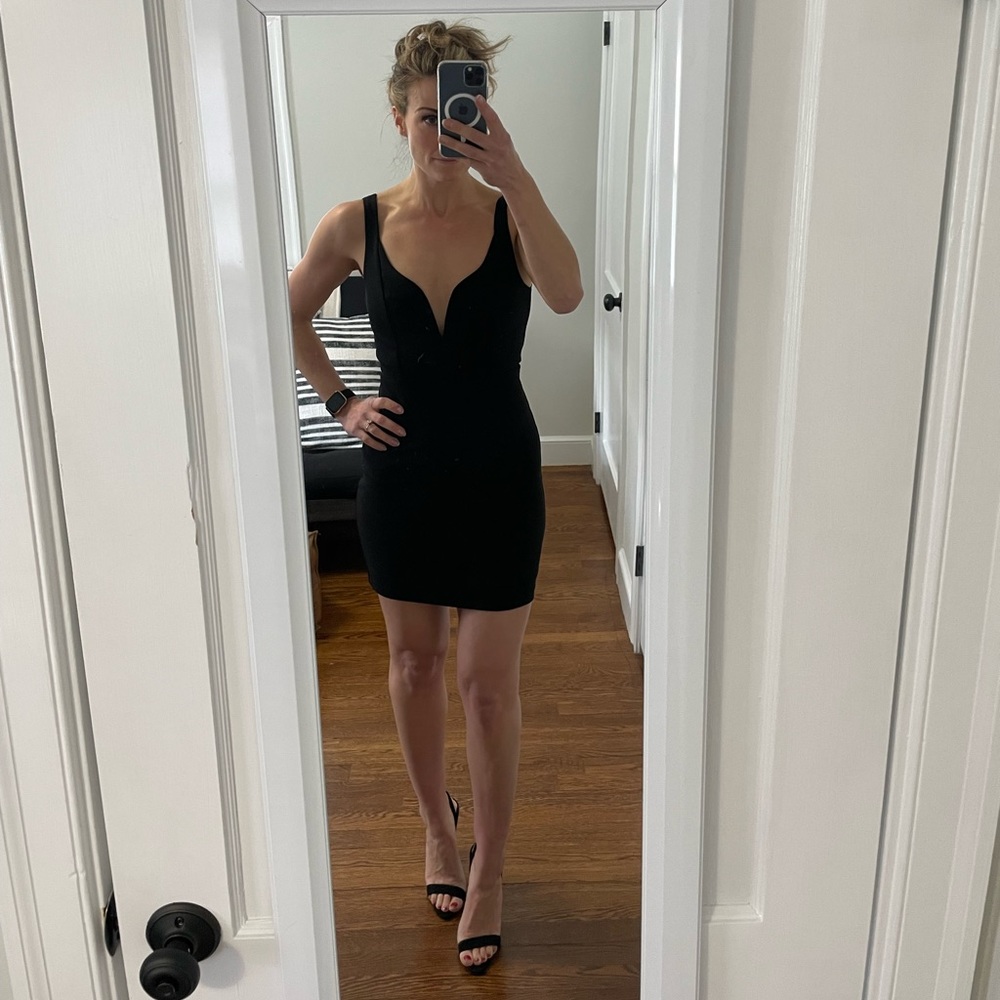 Black mini cocktail dress. No tags, never worn.